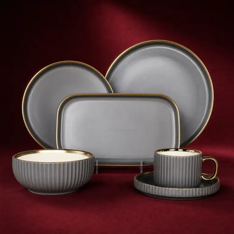 Grey Ribbed Tableware Set shown on a red studio background