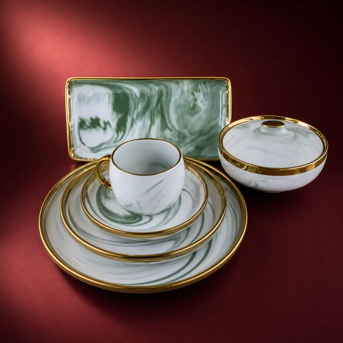 Green Marble Tableware shown on a red studio background