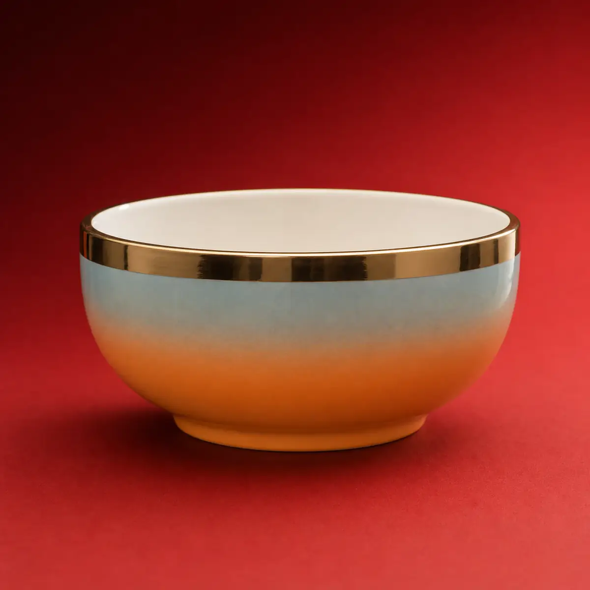 Warm Gradient Tea Bowl shown on a red studio background