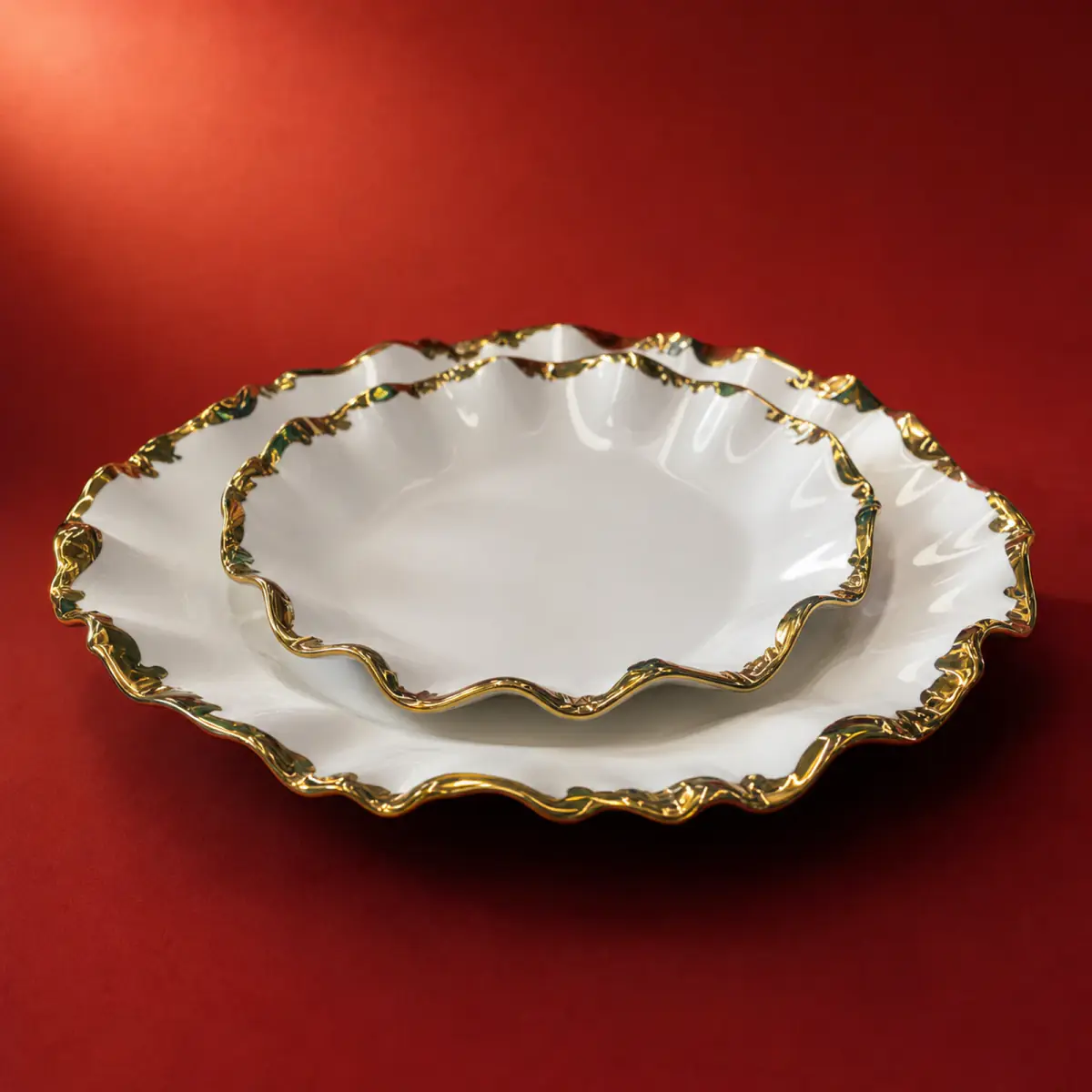 Electroplated Tableware shown on a red studio background
